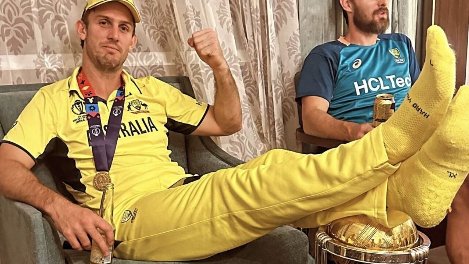 Mitchell Marsh poses with feet atop World Cup trophy after Australia defeat India; internet outraged
